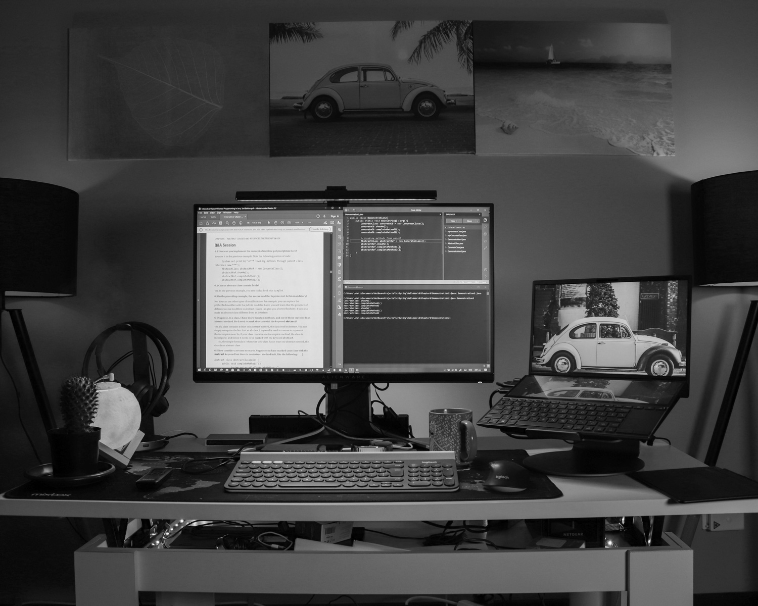 black flat screen computer monitor turned on beside black computer keyboard
