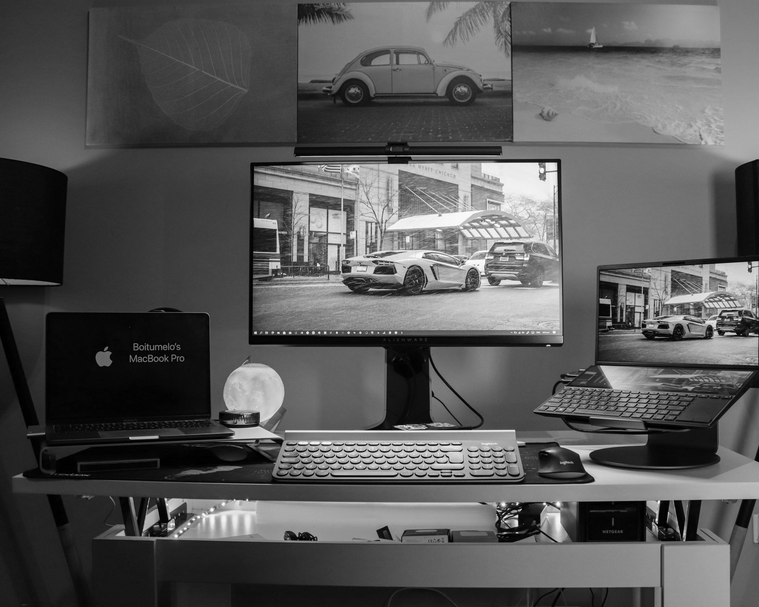 black laptop computer on white desk