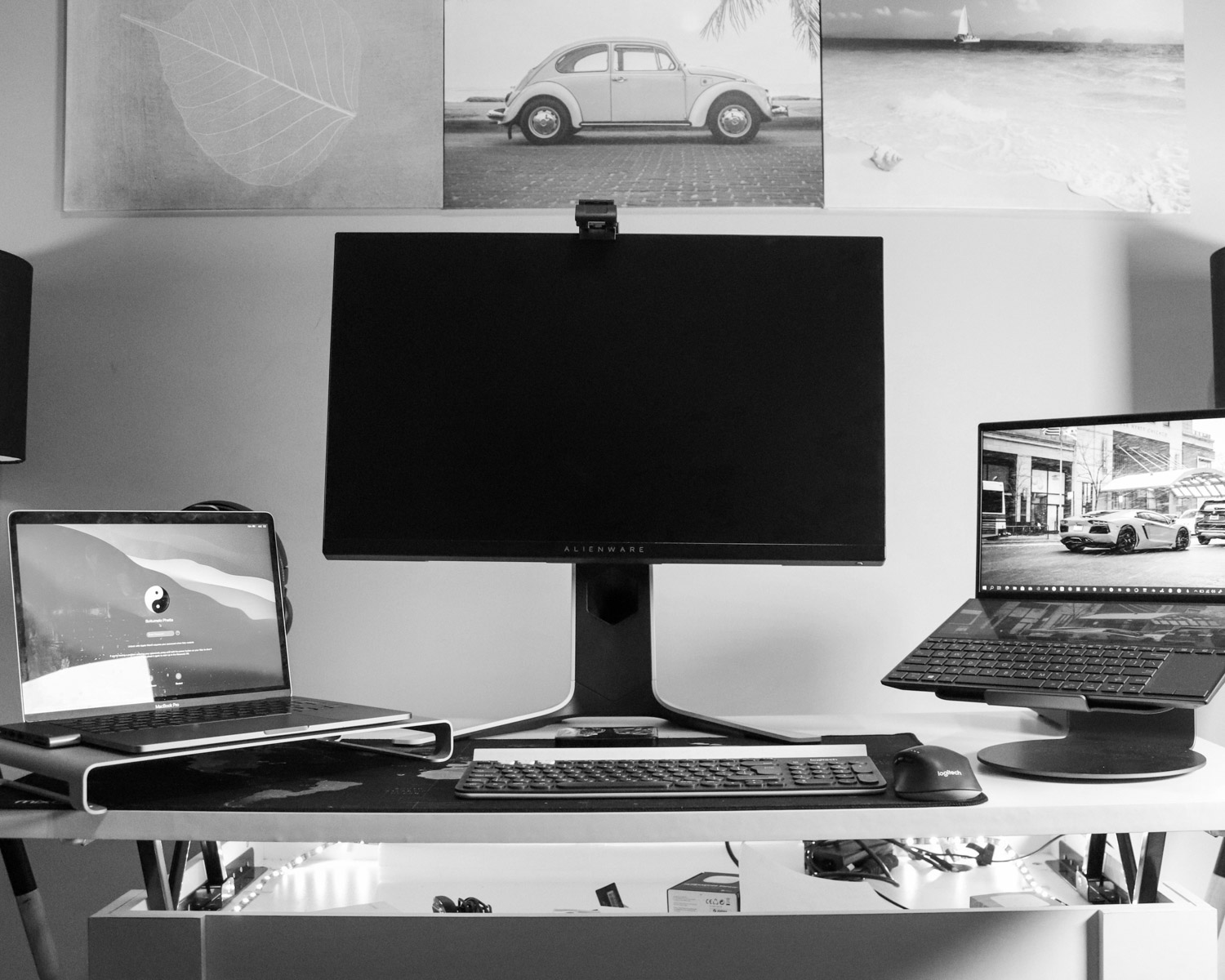 black flat screen computer monitor on white desk