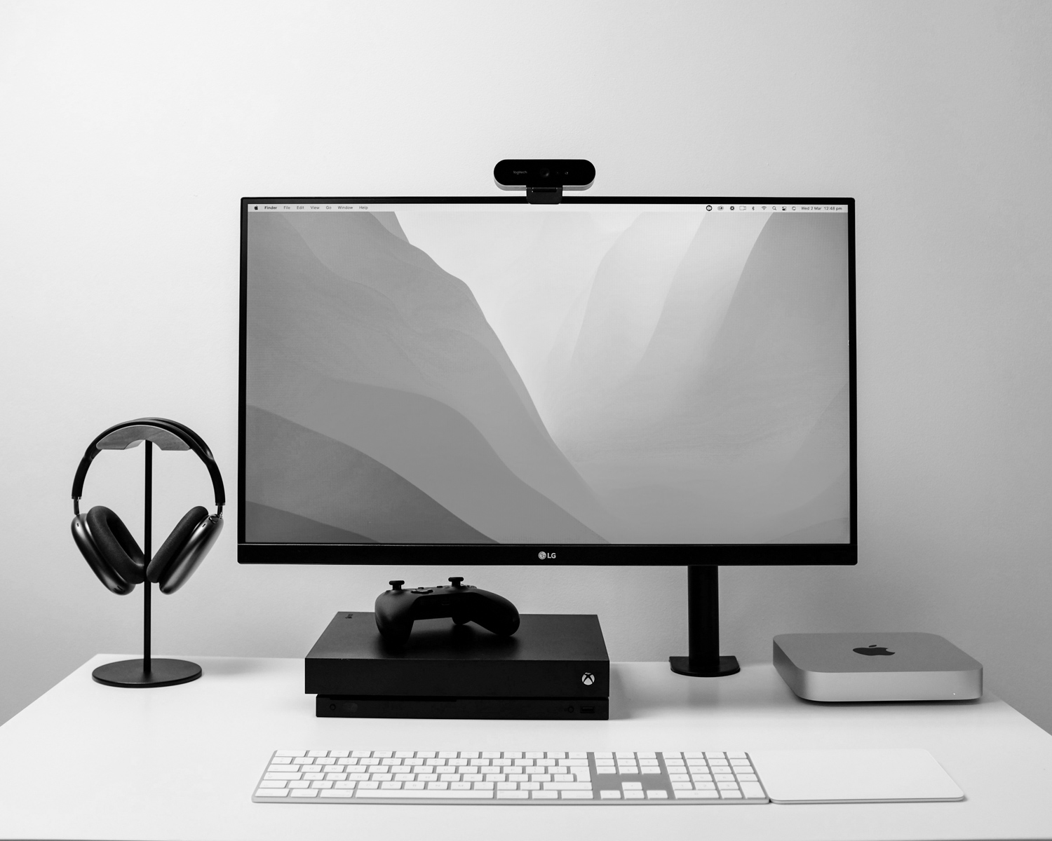 a computer monitor sitting on top of a desk