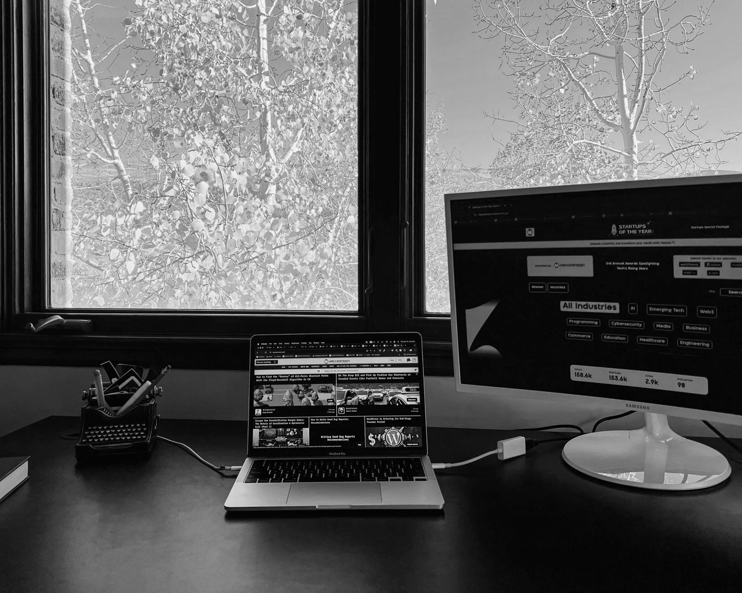 A laptop computer sitting on top of a desk