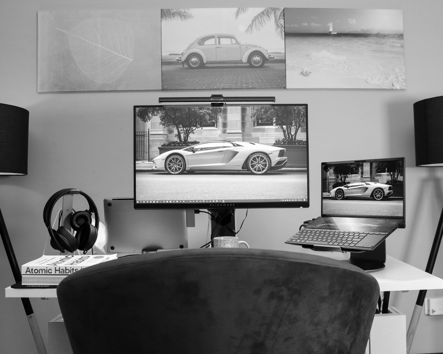black flat screen computer monitor on white desk