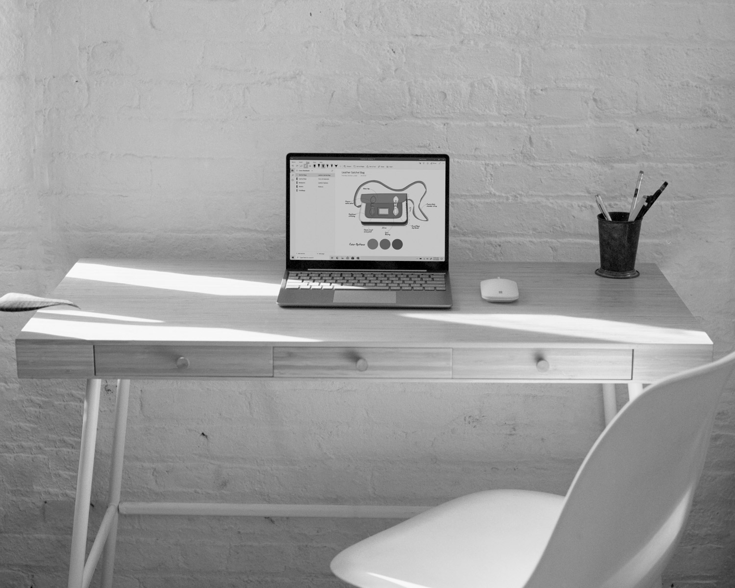 Surface computer on brown wooden table