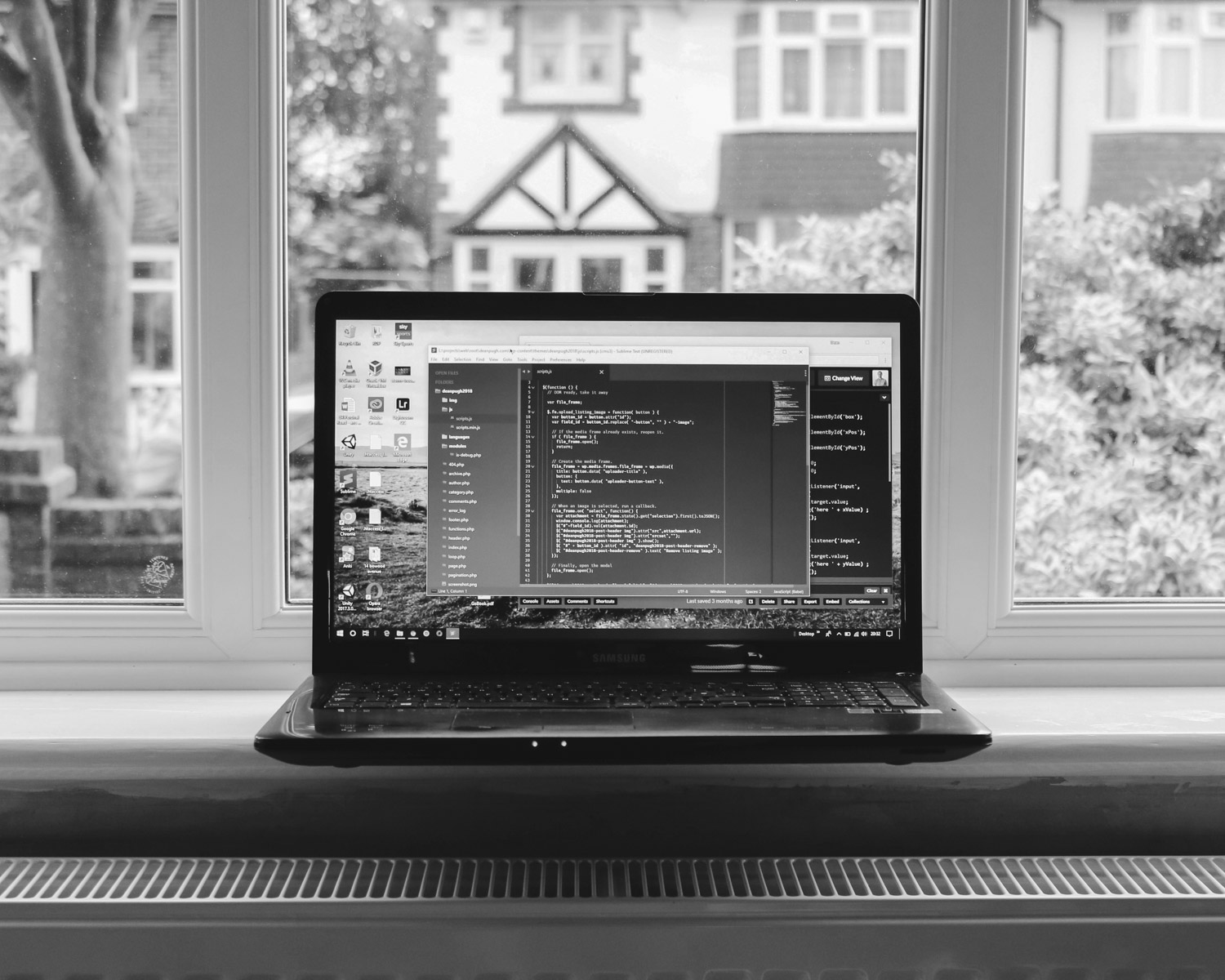black laptop computer turned on