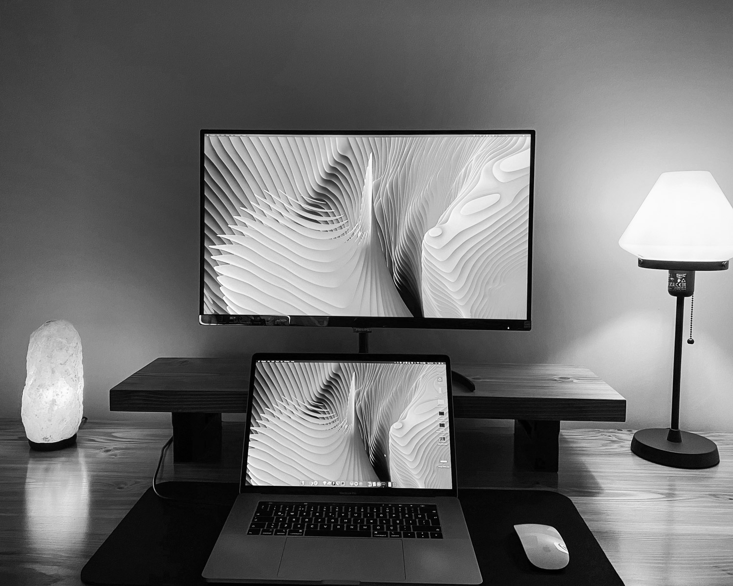 macbook pro on brown wooden table