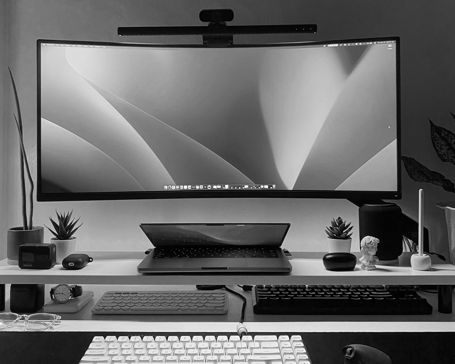 a computer monitor sitting on top of a desk
