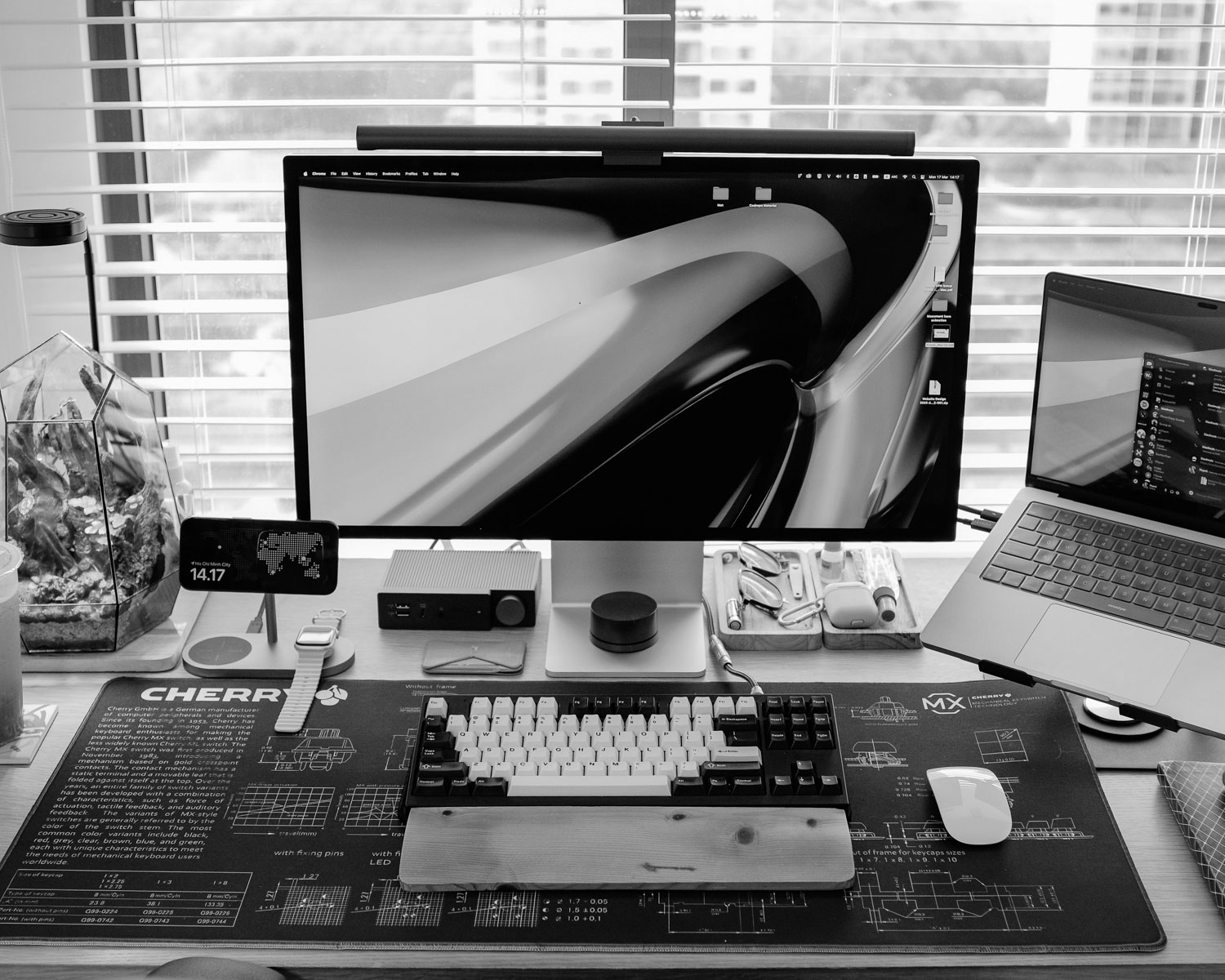 A sleek, modern desk setup with multiple screens.