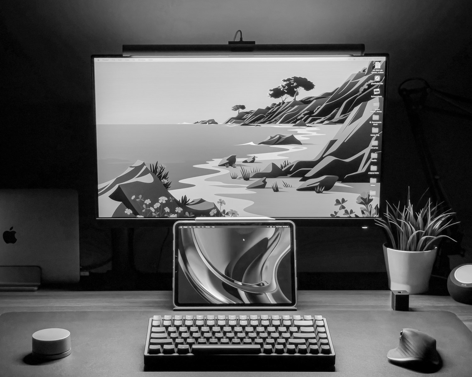 a desktop computer sitting on top of a wooden desk