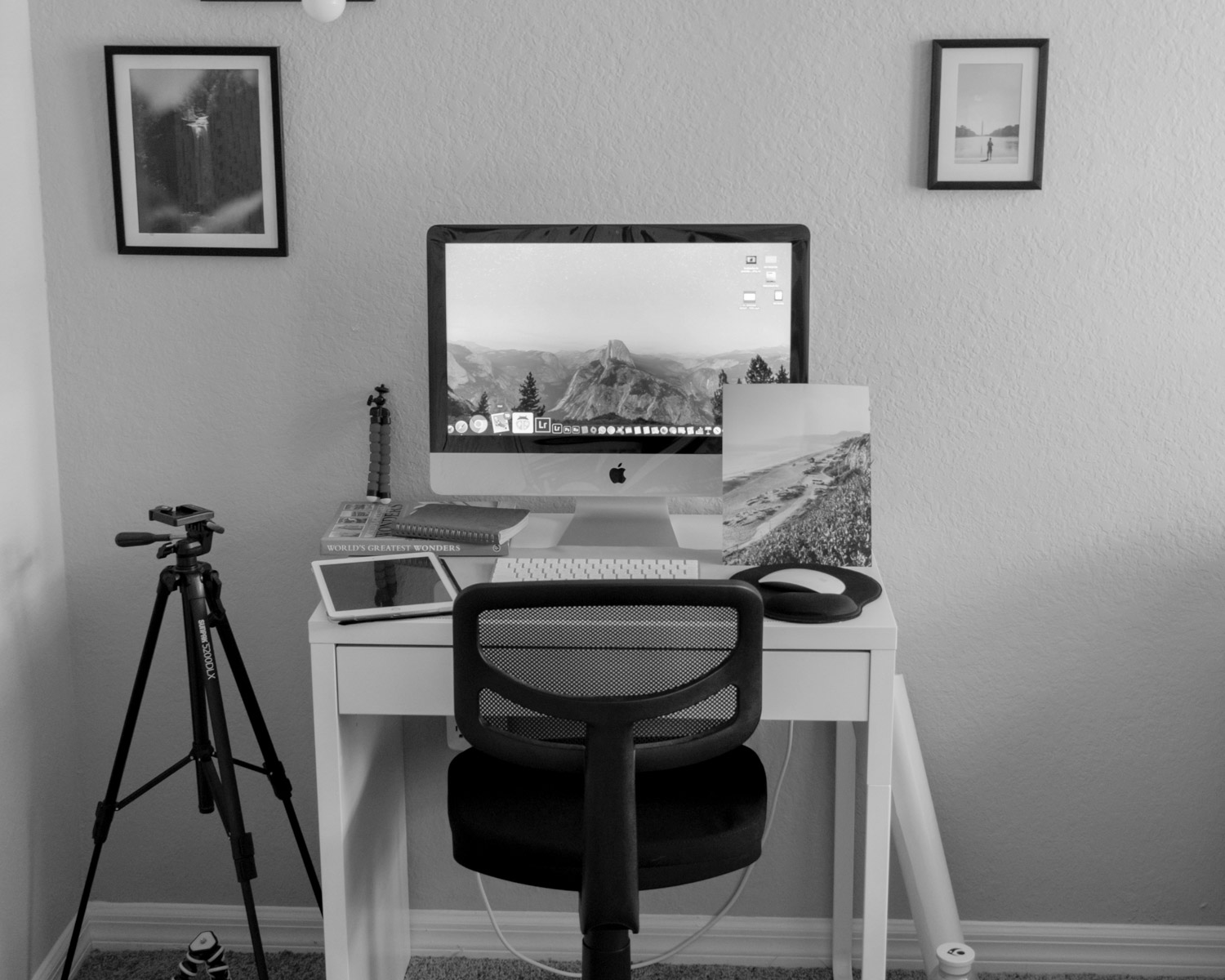 black flat screen computer monitor on brown wooden table