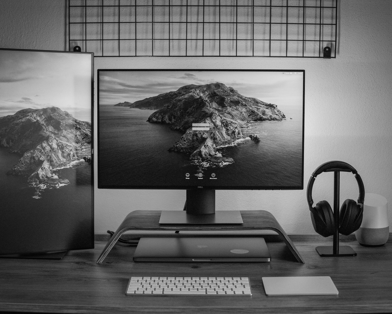 black and gray laptop computer on brown wooden table