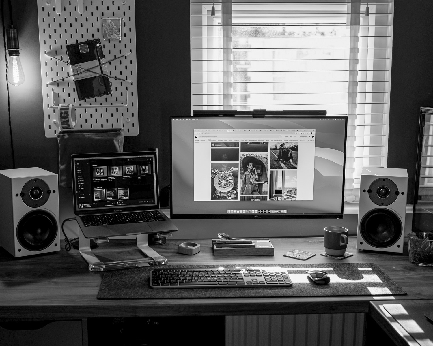 black flat screen computer monitor on brown wooden desk