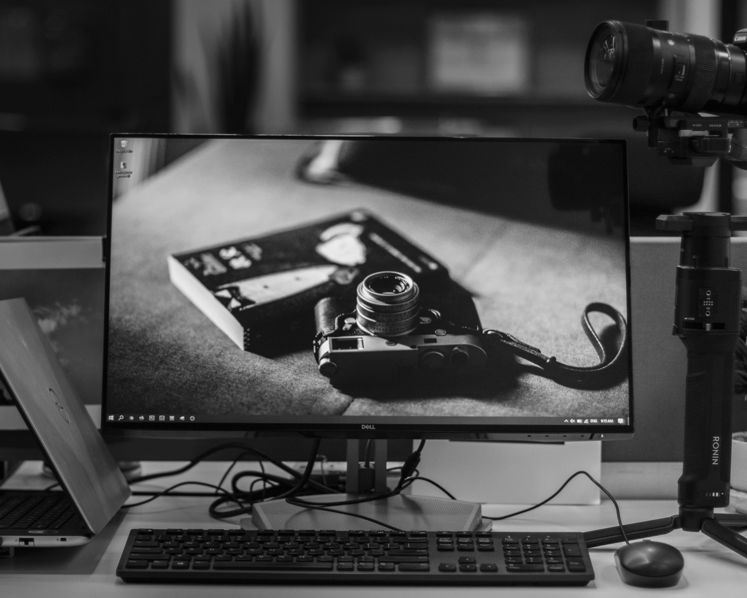 black dslr camera on black table