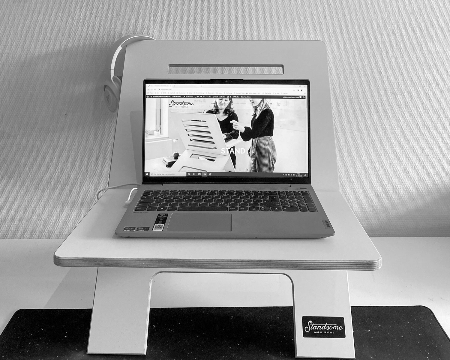 macbook air on white table
