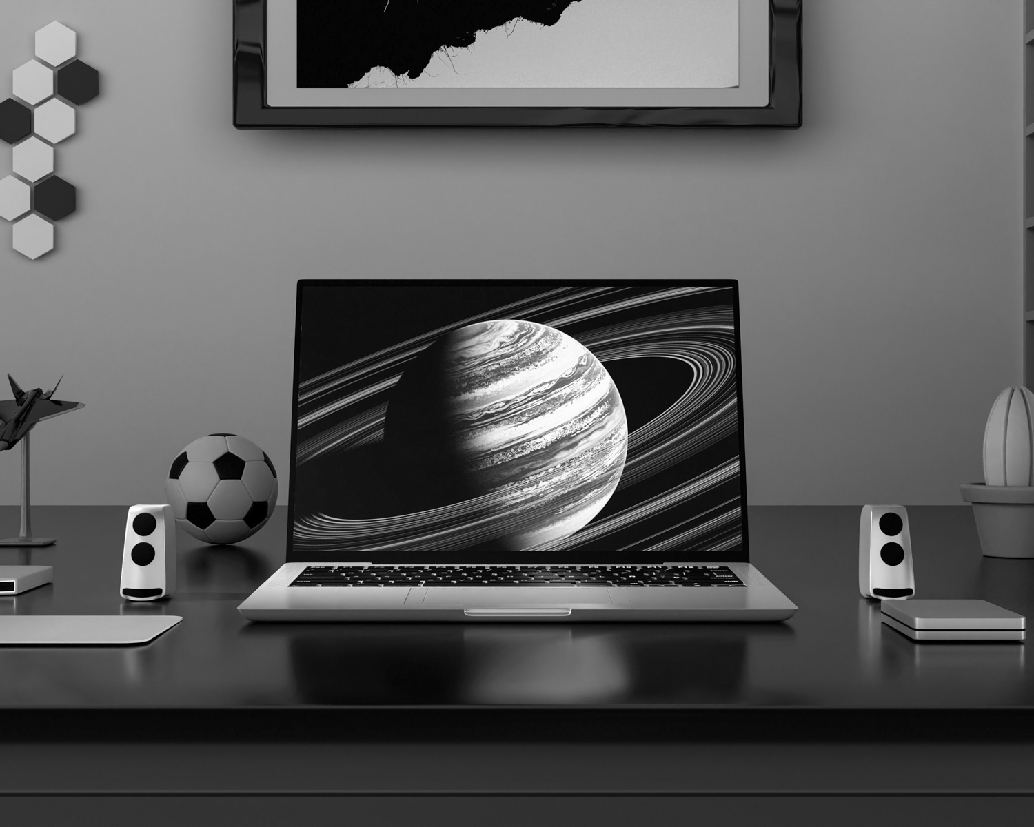 a laptop computer sitting on top of a wooden desk