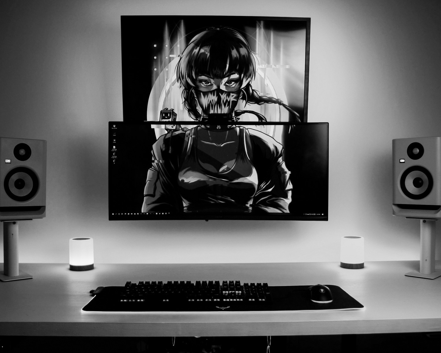 a computer monitor sitting on top of a desk