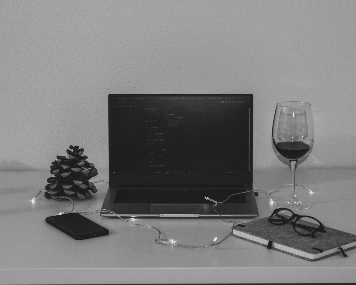 black flat screen computer monitor beside black laptop computer