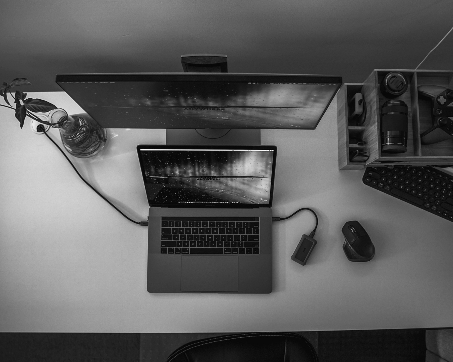 gray laptop computer on white table