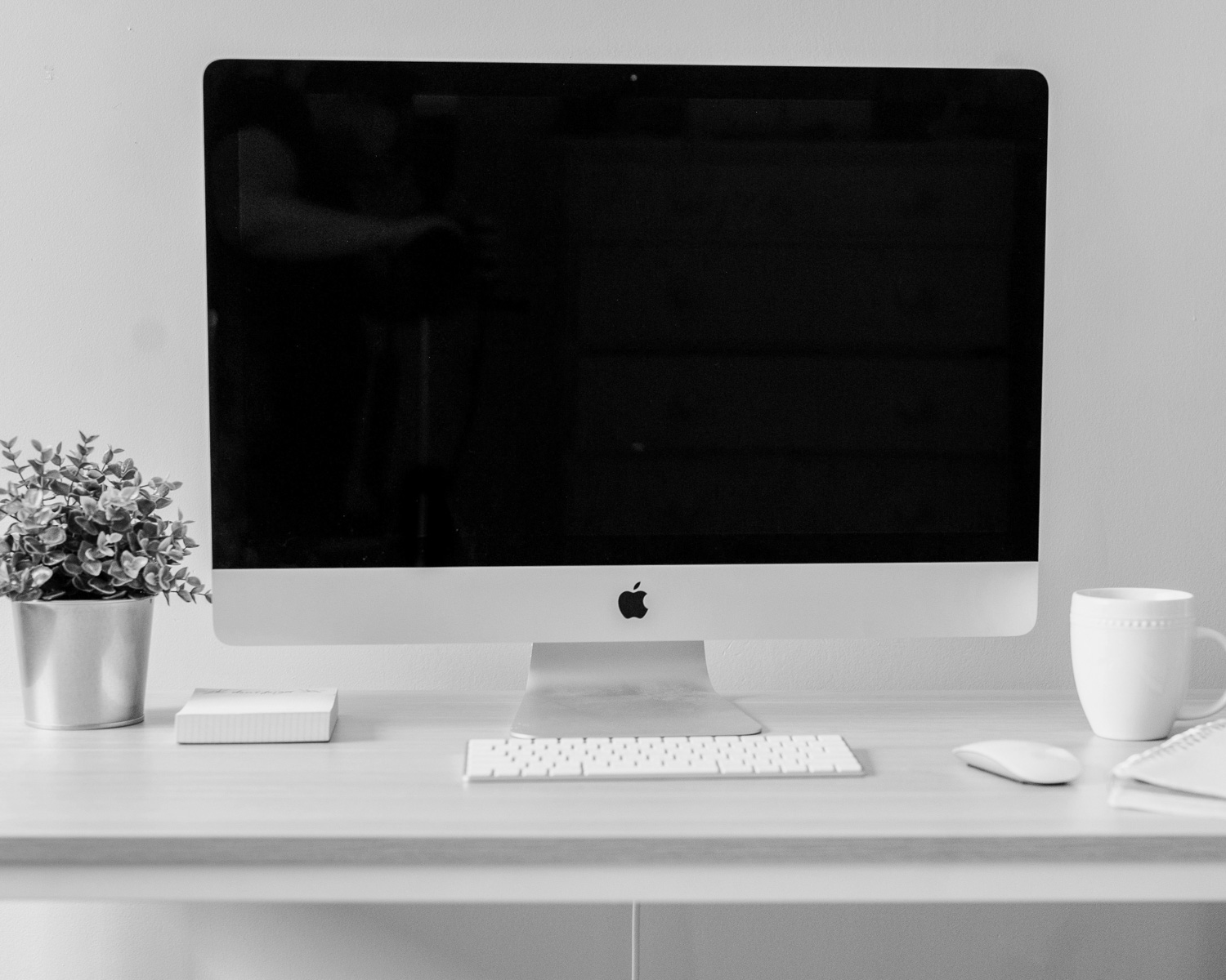 silver iMac, Apple Magic Keyboard, and Apple Magic Mouse