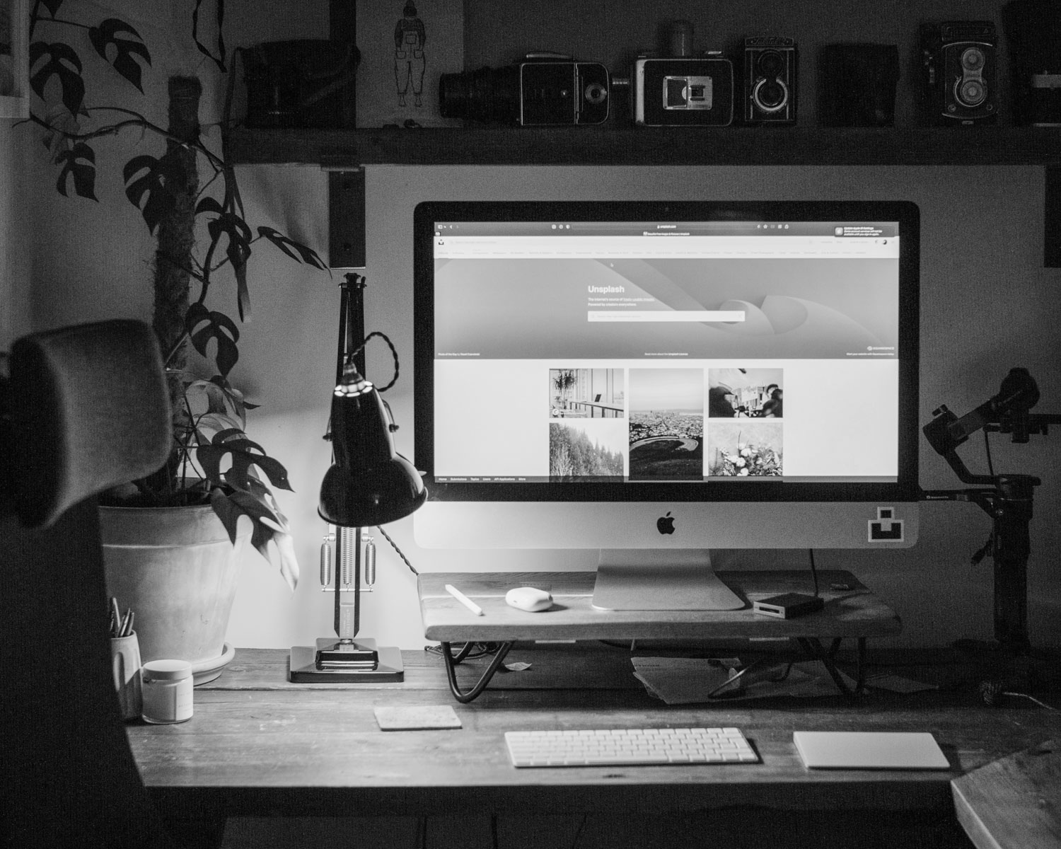 a desktop computer sitting on top of a wooden desk