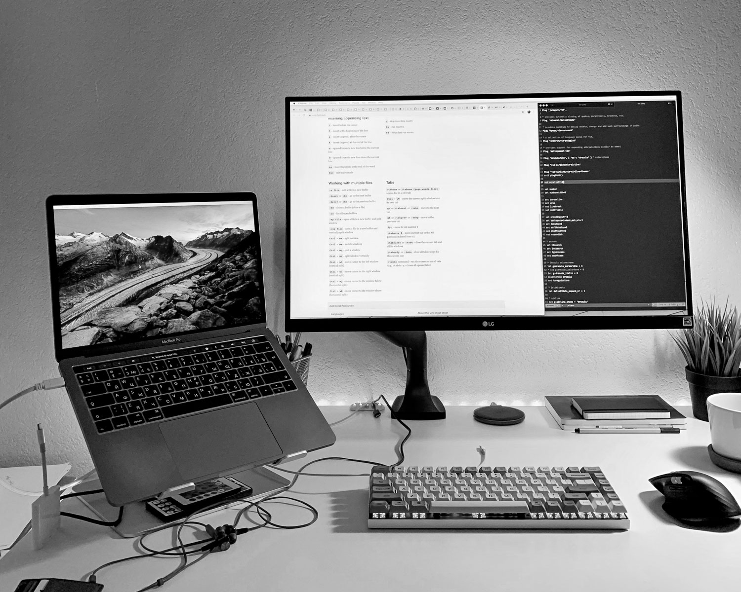 black flat screen computer monitor turned on beside black computer keyboard and black computer mouse