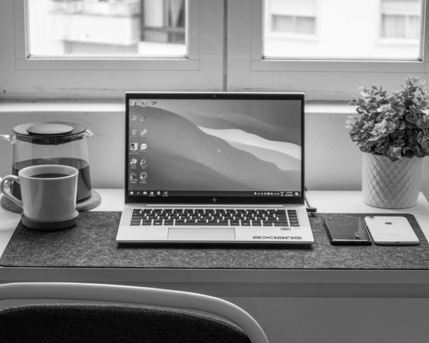 macbook pro on white table