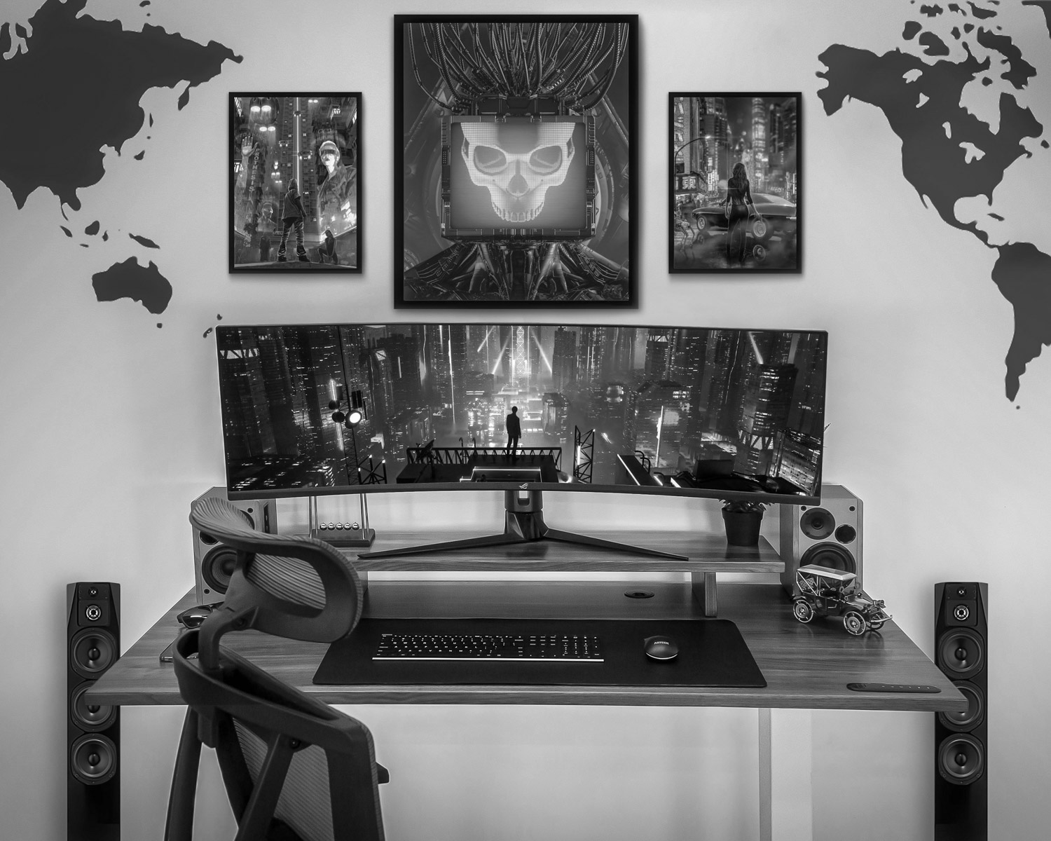 a desk with a monitor and keyboard on it