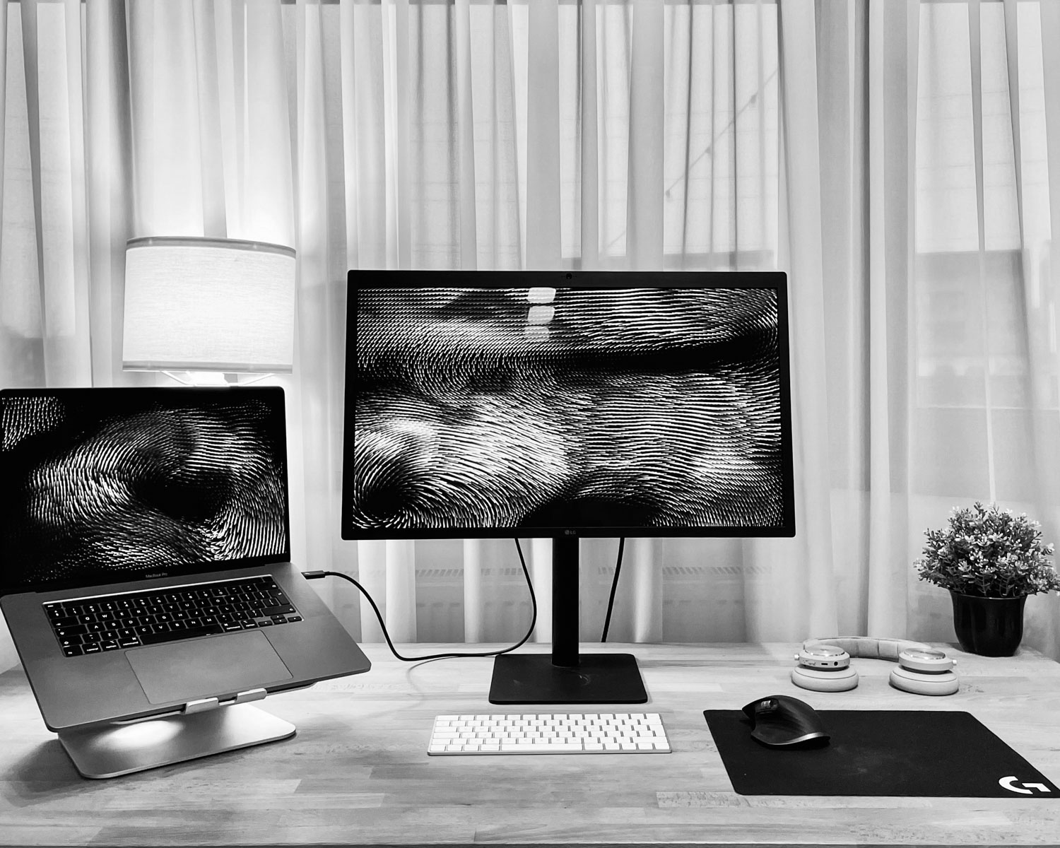macbook pro on brown wooden table