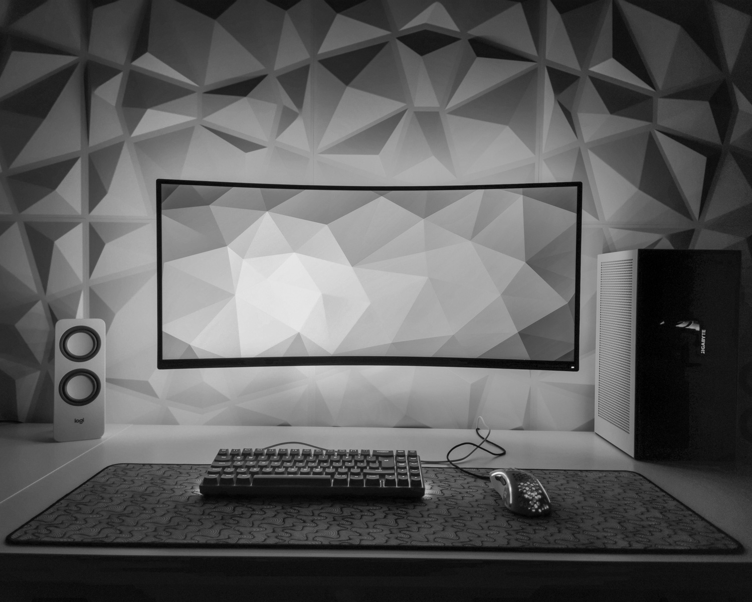 a computer monitor sitting on top of a desk