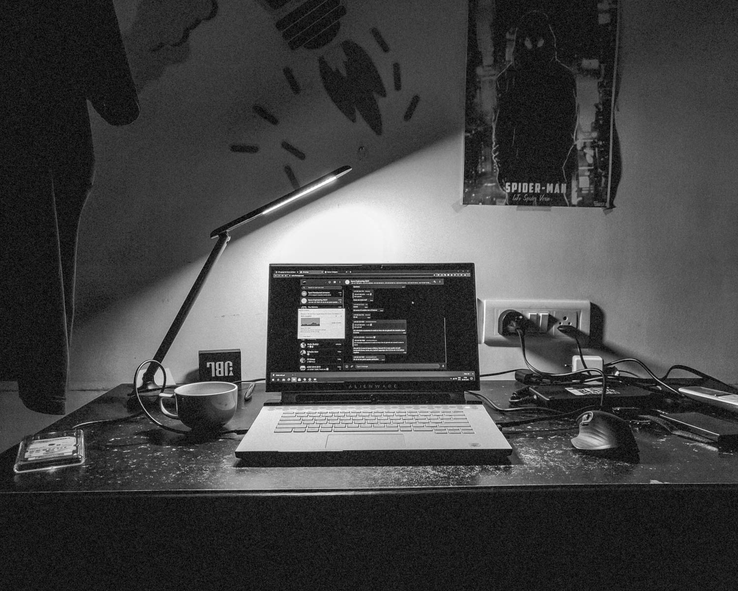 macbook pro on black table