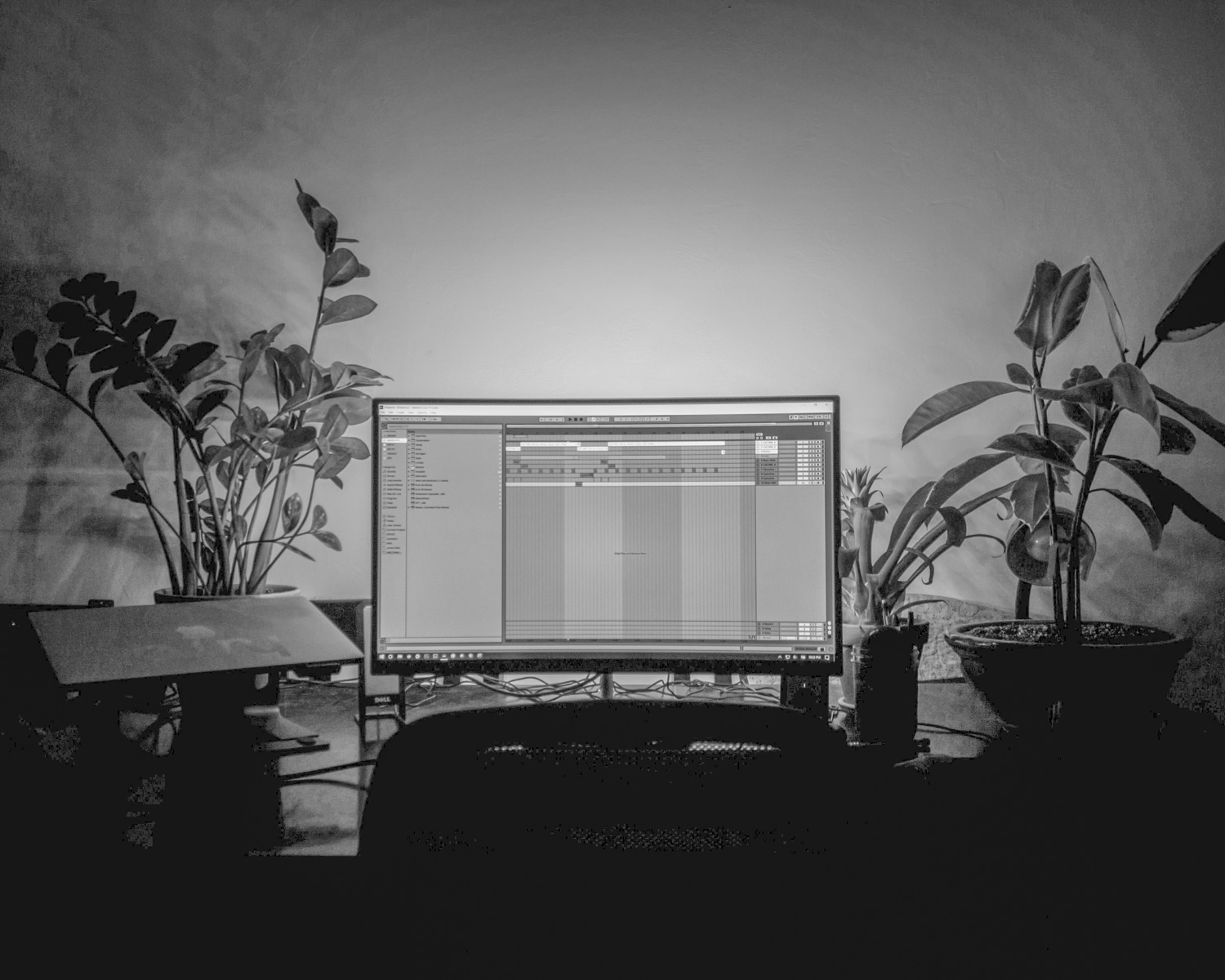 a computer monitor sitting on top of a desk