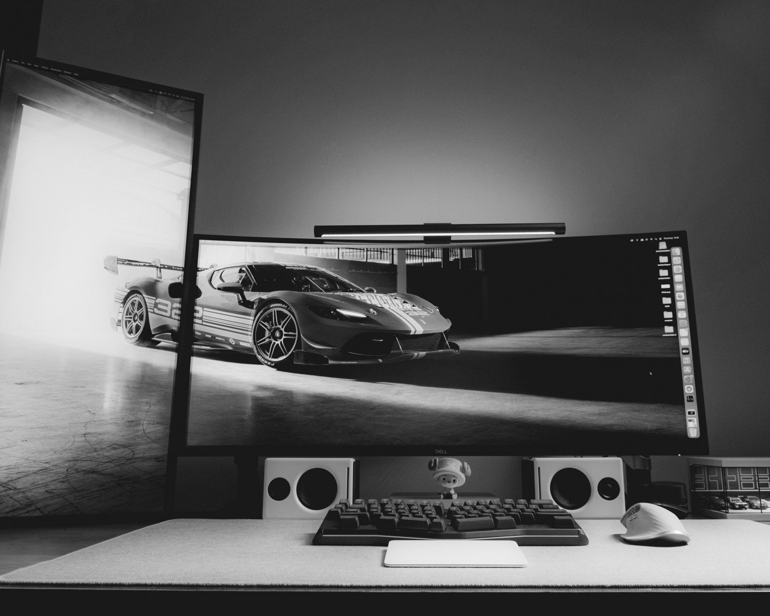 A computer monitor sitting on top of a desk