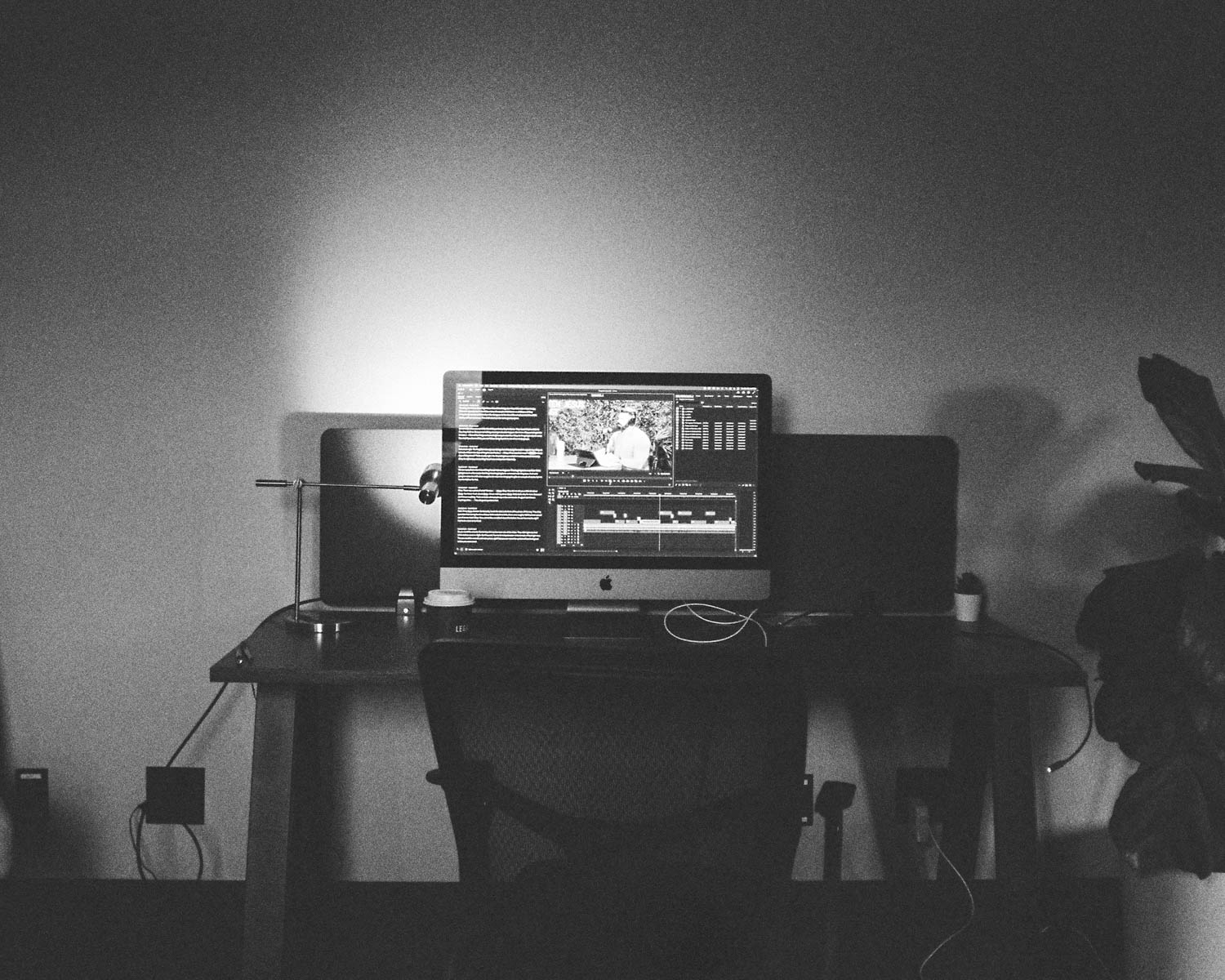 a computer monitor sitting on top of a desk